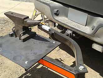 Farrier's anvil mounted on StowAway SwingAway Frame on Toyota Tundra