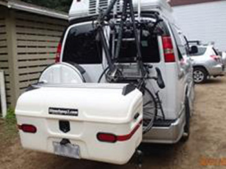 StowAway MAX Cargo Carrier on van with tandem bike on door-mounted bike rack