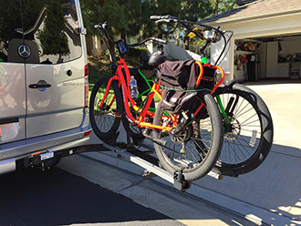StowAway SwingAway Frame on Mercedes Sprinter van with Thule wheel-mounted bike rack, 2 bikes, open