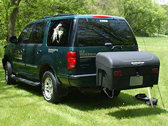 Fly Fisherman Ford Explorer with StowAway Standard Cargo Carrier