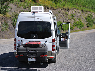 Mercedes Sprinter van with StowAway MAX Cargo Carrier on Alaska Highway, Yukon Territory, Canada