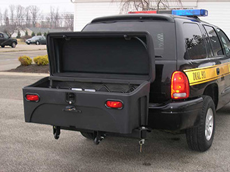 Police vehicle with StowAway Standard Cargo Carrier lid open