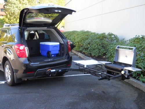 StowAway Hitch Grill Station with Cuisinart grill on an SUV with lift gate open