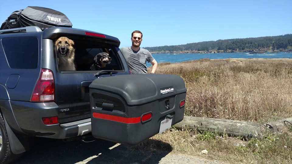 StowAway MAX Cargo Carrier mounted on Toyota SUV with dogs looking out the back window in Mendocino, California