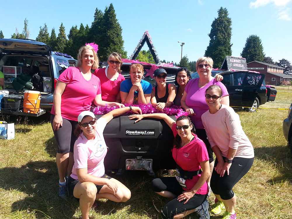 StowAway MAX Cargo Carrier surrounded by Almost Angels Portland to Coast walking team