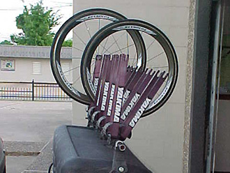 Yakima bike wheel rack mounted to lid of StowAway Standard Cargo Carrier