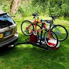 hitch bike cargo rack by Stowaway holding 2 bikes, gear